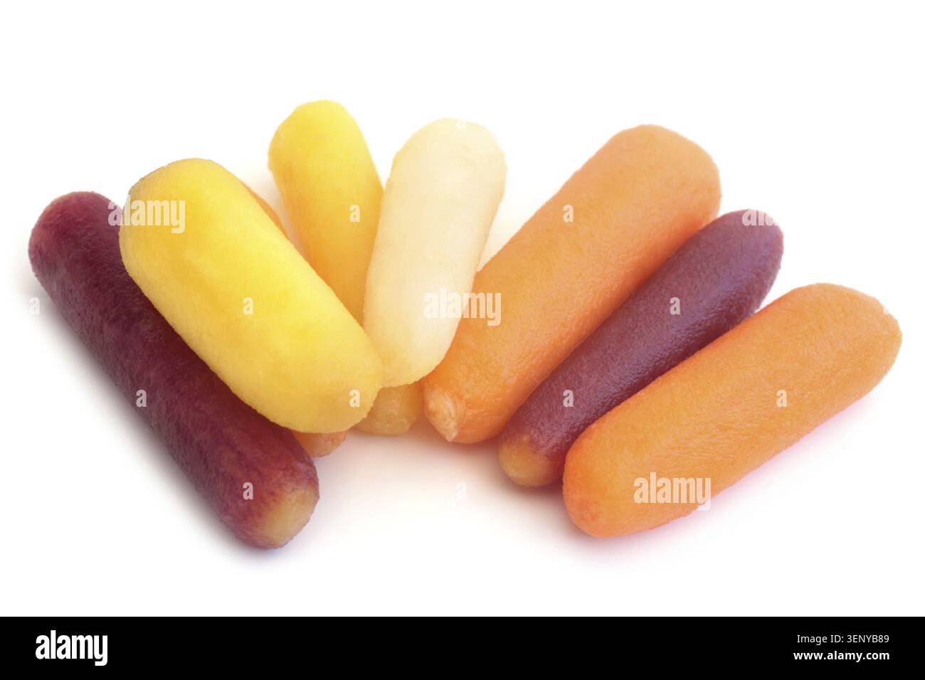 Baby rainbow carrots on white background Stock Photo