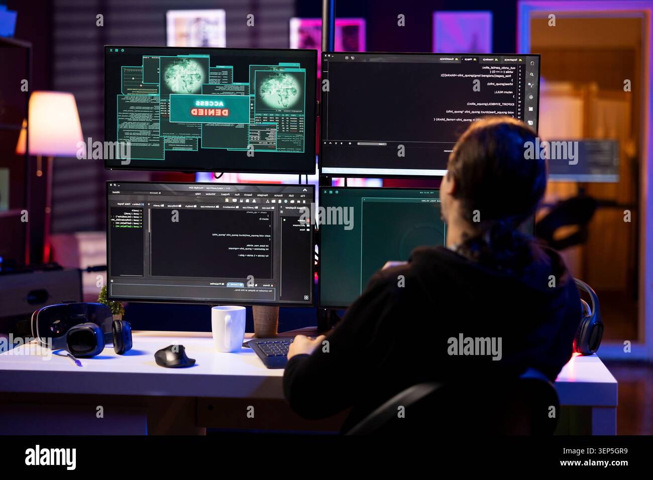 Hacker at home getting access denied error while doing computer sabotage using ransomware while rogue programmer failing to penetrate firewalls while trying to steal victim data. Stock Photo