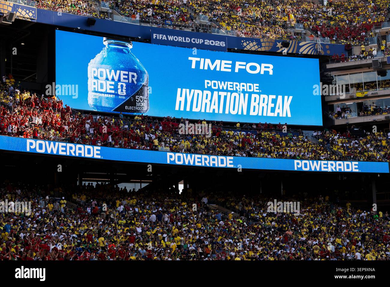 A giant screen displays the write 'Time for a powerade hydration break ...