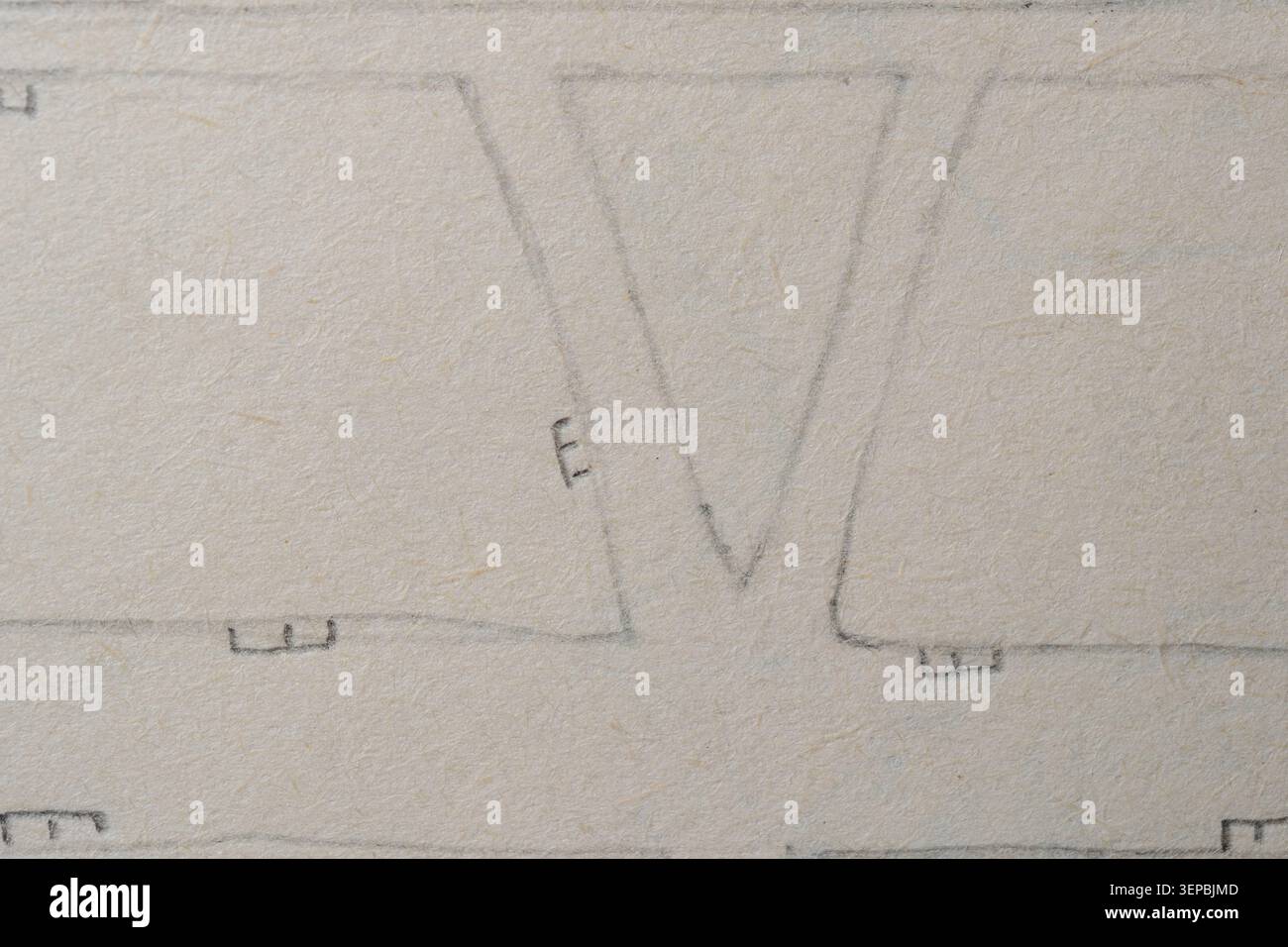 Delicate doodles show triangular forms and lines on a soft, light paper surface. Stock Photo