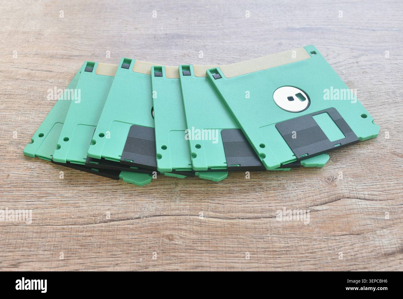 floppy disk old technology for saving data arranging on table Stock Photo