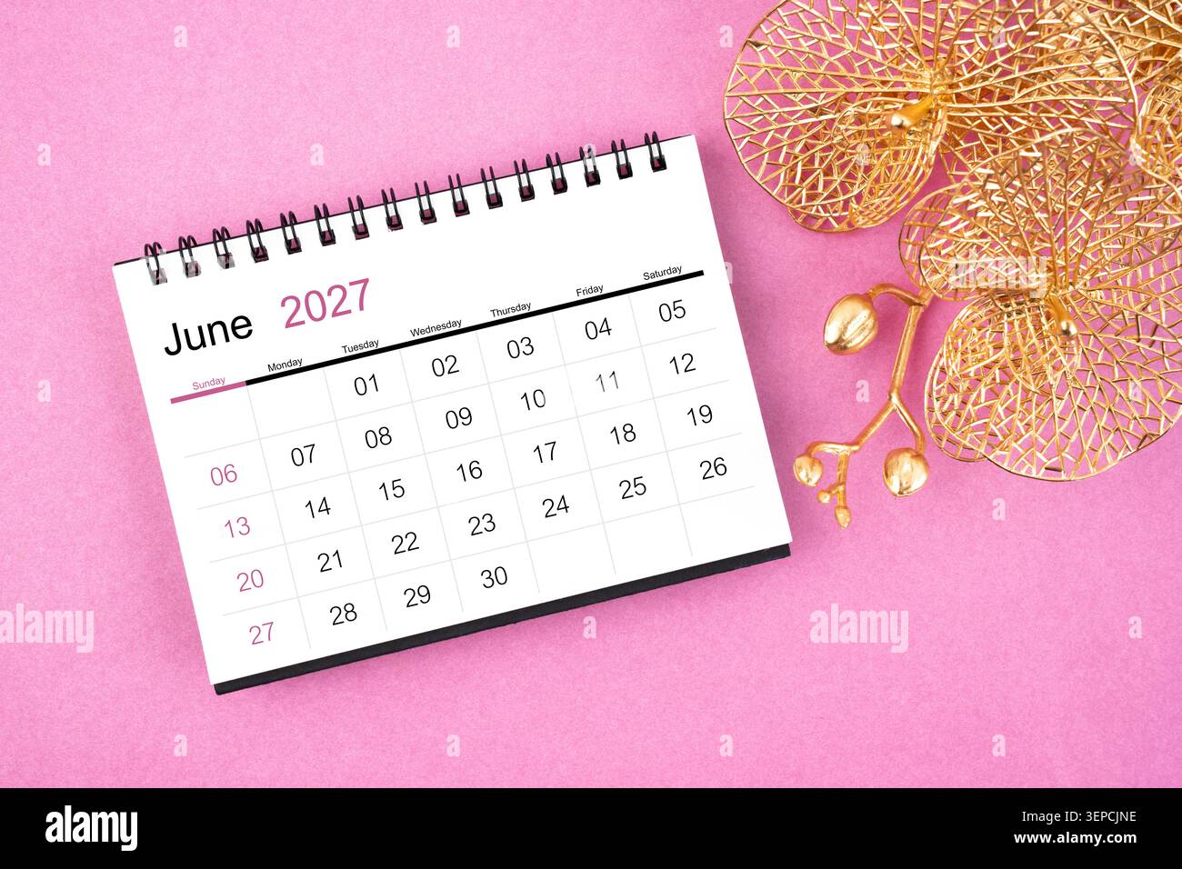 June 2027 desk calendar on yellow background, Front view Stock Photo - Alamy