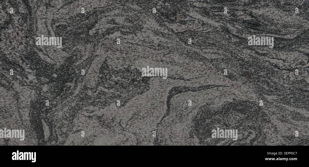 Gray natural granite surface showing detailed stone texture and abstract pattern Stock Photo