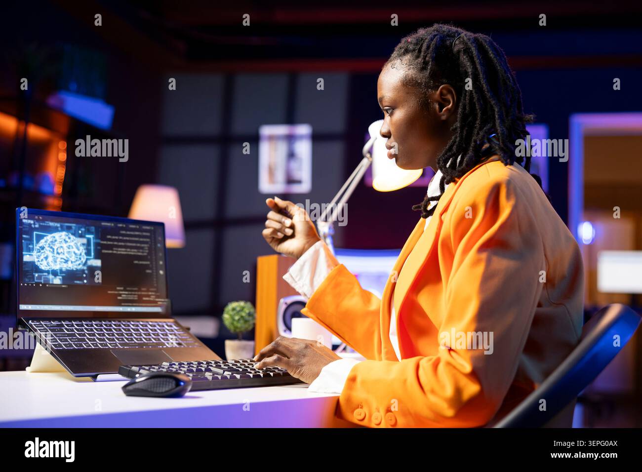 Programmer in living room office typing on keyboard, updating artificial intelligence neural networks, writing binary code scripts, freelancing system administrator upgrading high tech AI. Stock Photo