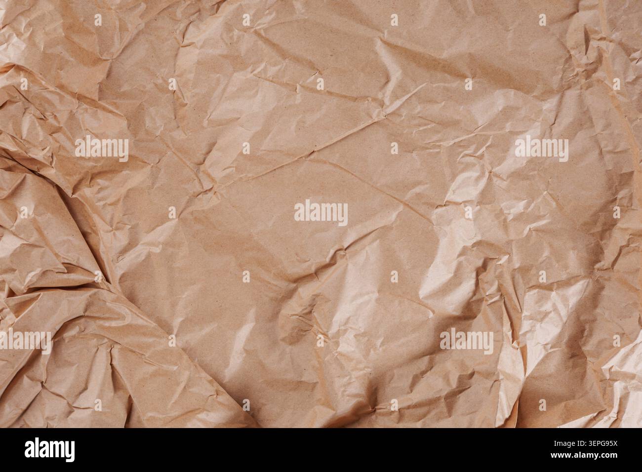 Large Wrinkled Kraft Wrapping Paper Background Texture Stock Photo