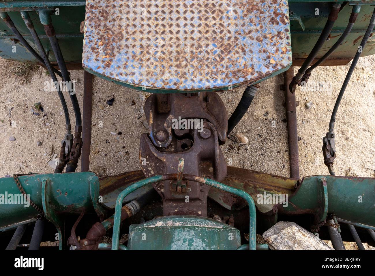 Rusted train car coupling mechanism from above Stock Photo