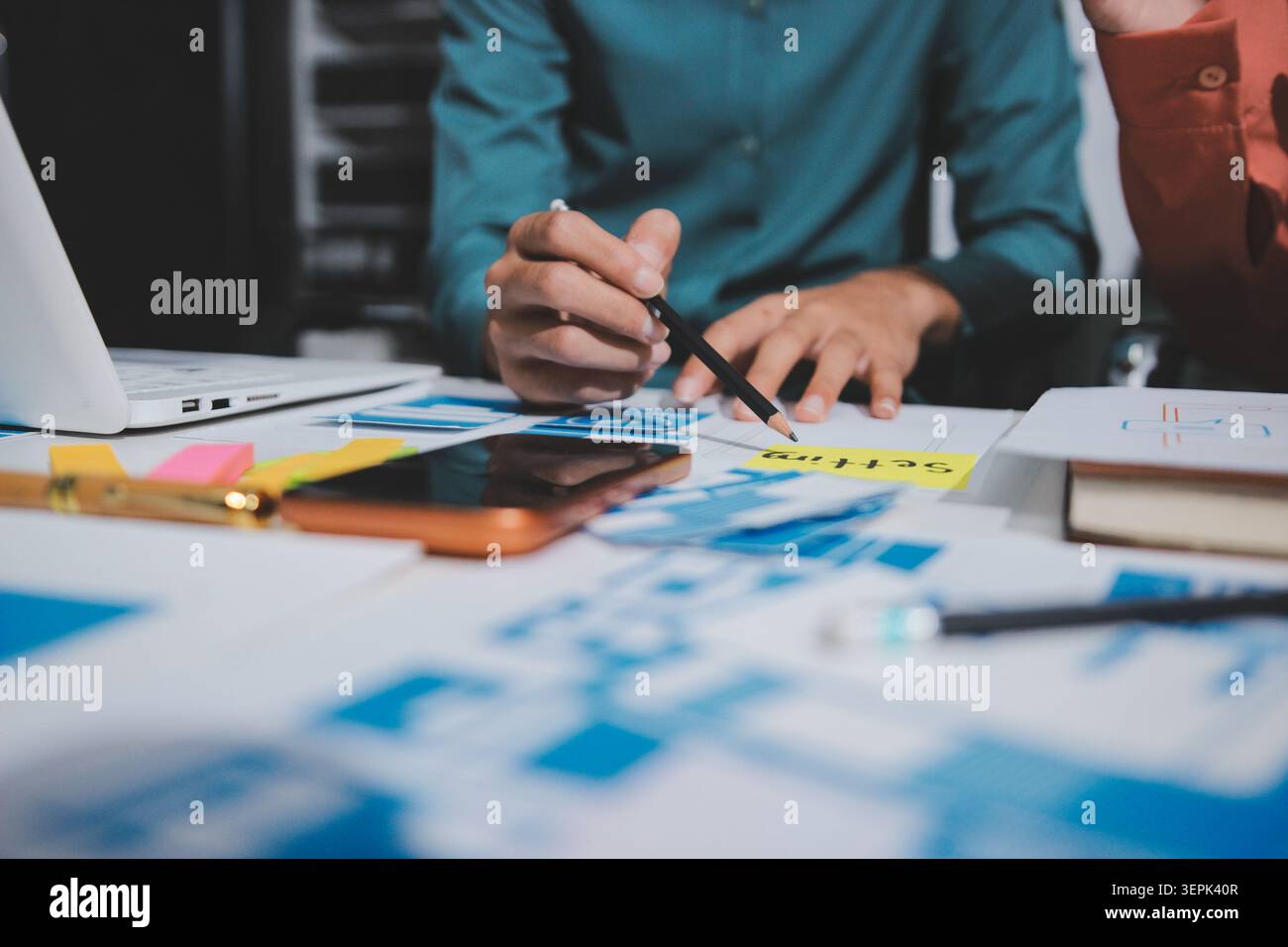 UI designer and UX developer brainstorm idea to design the application appearance in the early stage. Creative digital development agency. UX UI conce Stock Photo