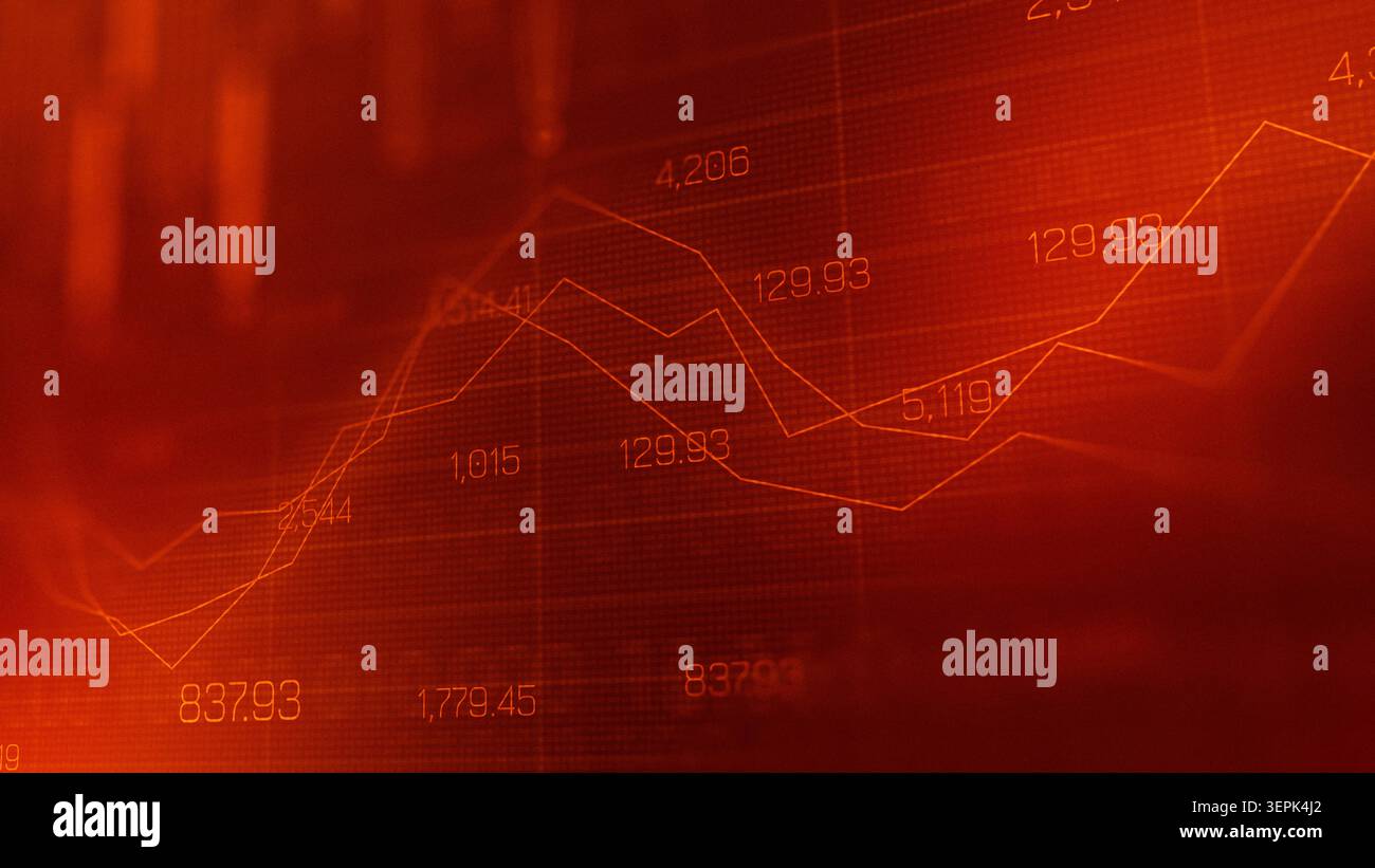 Traders analyze market trends using charts and graphs during trading hours Stock Photo