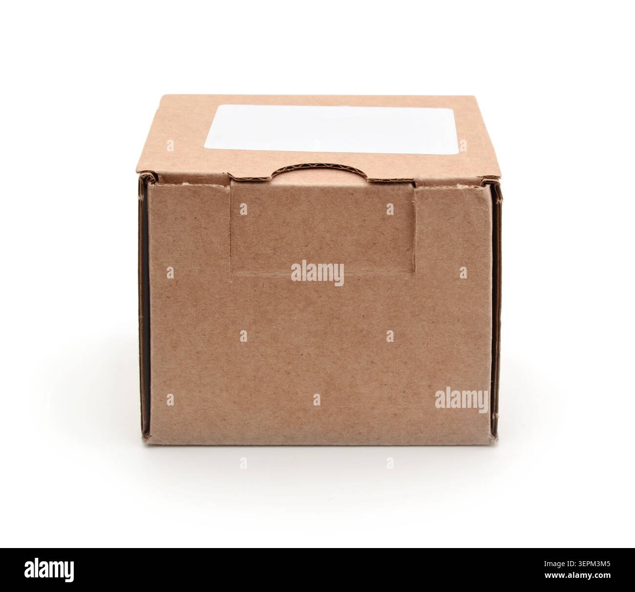 Closed cardboard box isolated on white. Stock Photo