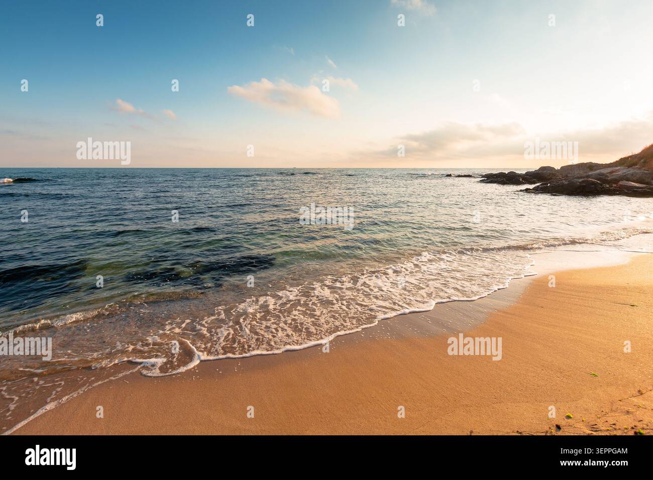 black sea landscape on a summer morning. bulgaria nature landscape with sandy beach. summer vacation at the sea shore concept. calm waves and empty be Stock Photo