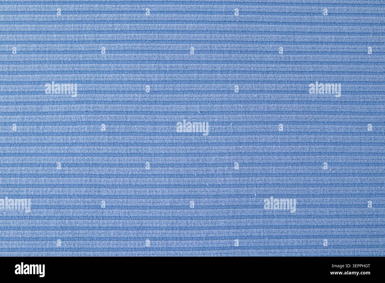 Soft blue ribbed fabric texture background with horizontal knit pattern for design projects Stock Photo