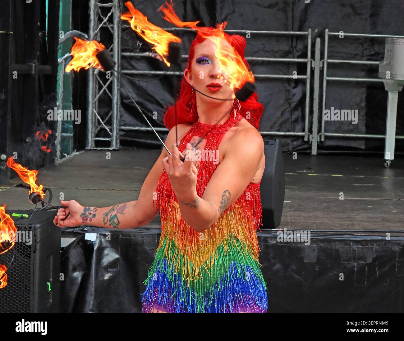 Fire eater blowing flames during Warrington Pride 2026 in Time Square ,Warrington, Cheshire, England, UK. WA1 2NT Stock Photo