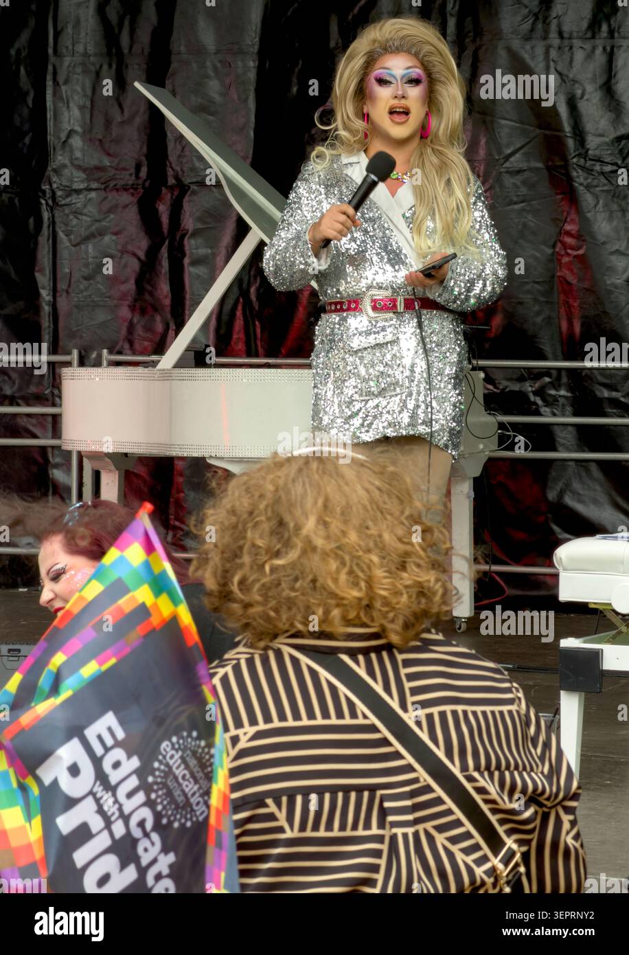 Kiki Inferno in a sparkling silver costume during the Warrington Pride celebrations at Time Square, Warrington, 13 June 2026 Stock Photo