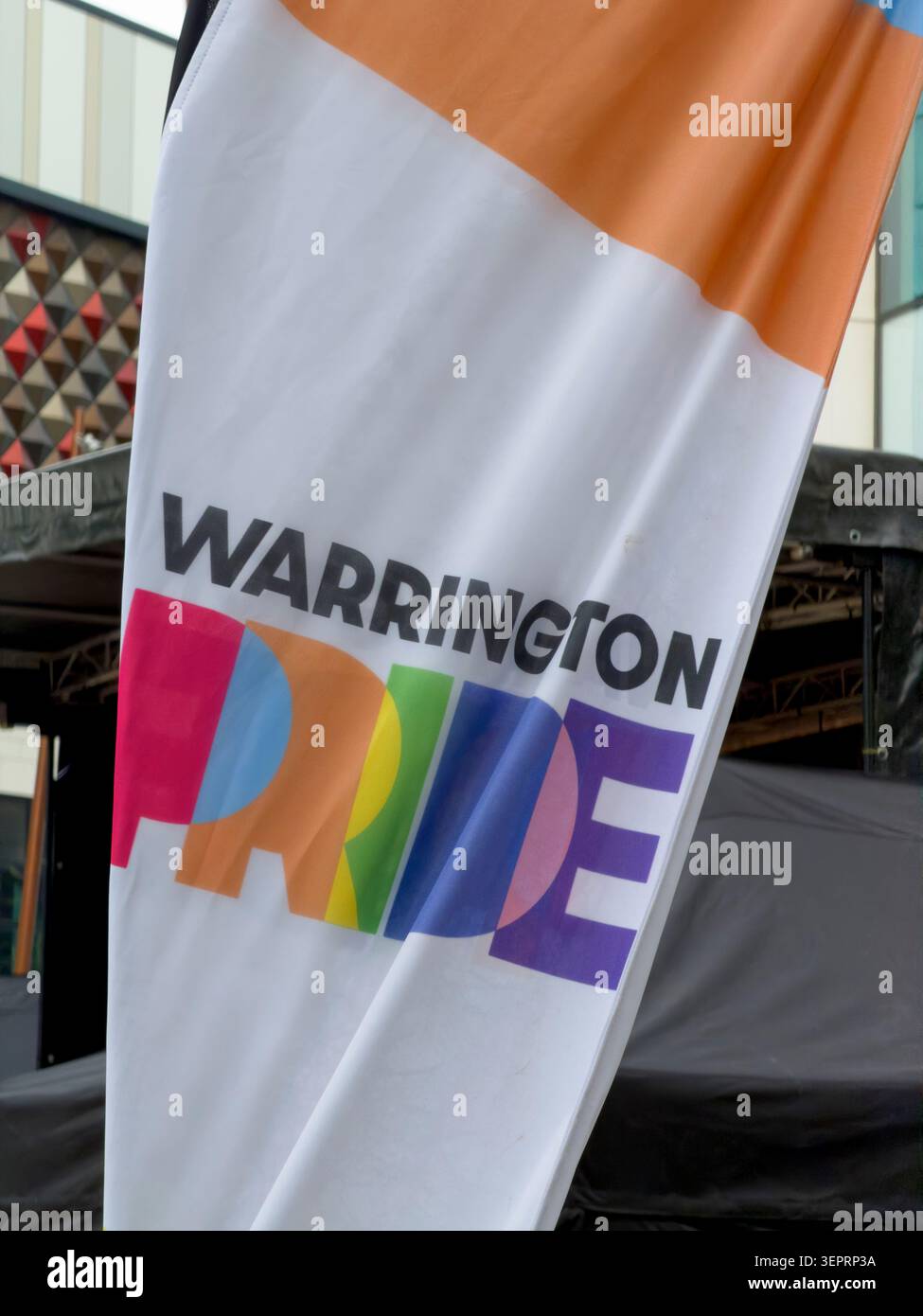 Warrington Pride 2026 logo banner in the town centre before the LGBTQ+ celebration across multiple venues on 13 June 2026. Stock Photo
