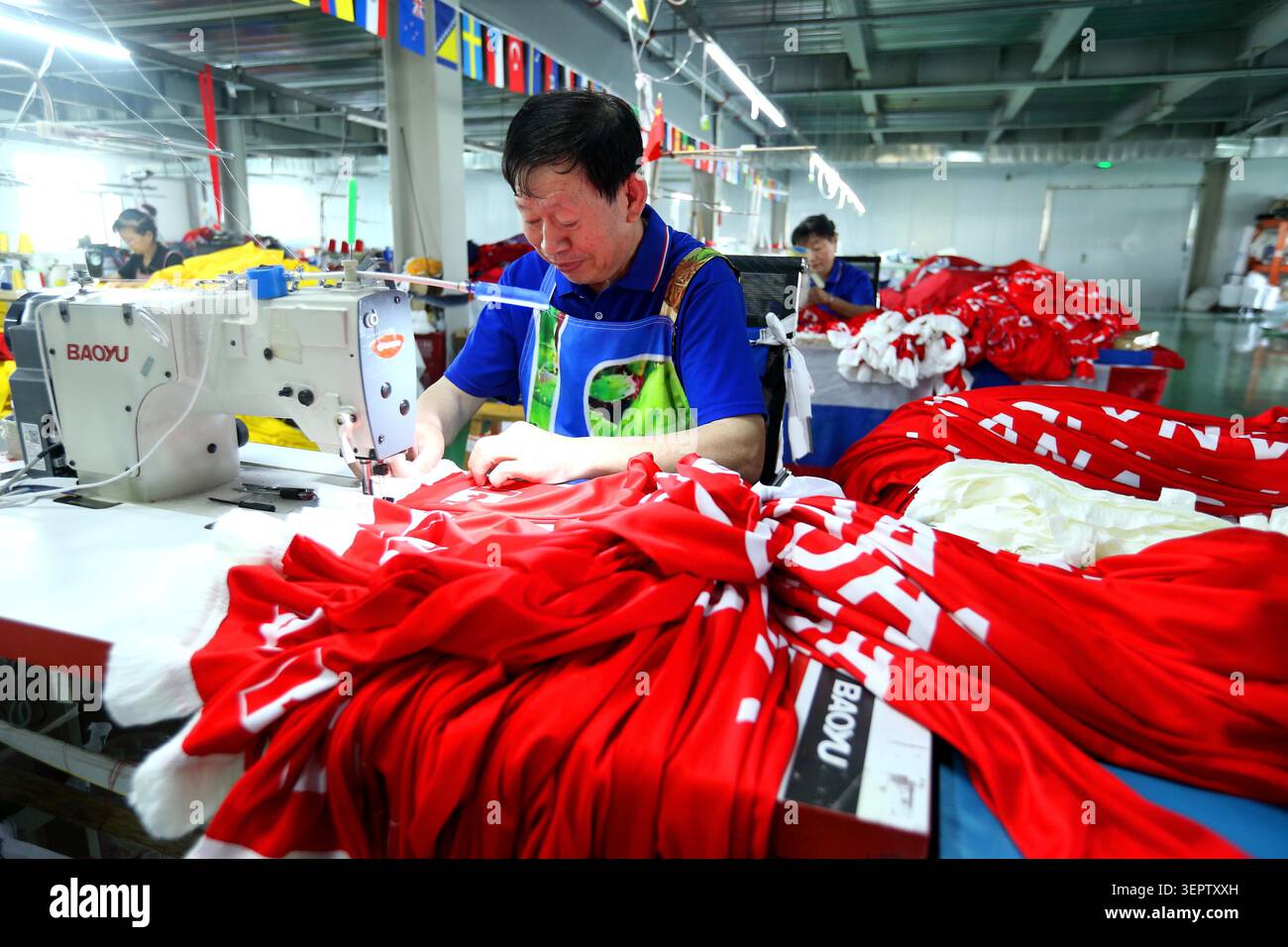 Workers At Wandelong Textile Technology Co Ltd Produce National workers-at-wandelong-textile-technology-co-ltd-produce-national