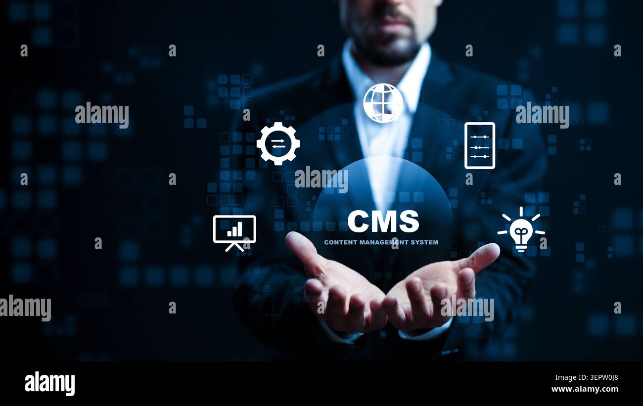 Man presenting content management system icons on digital interface in dark setting Stock Photo