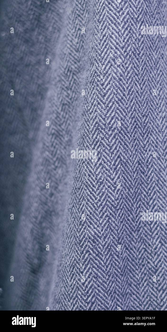 Grey herringbone wool fabric texture close up Stock Photo