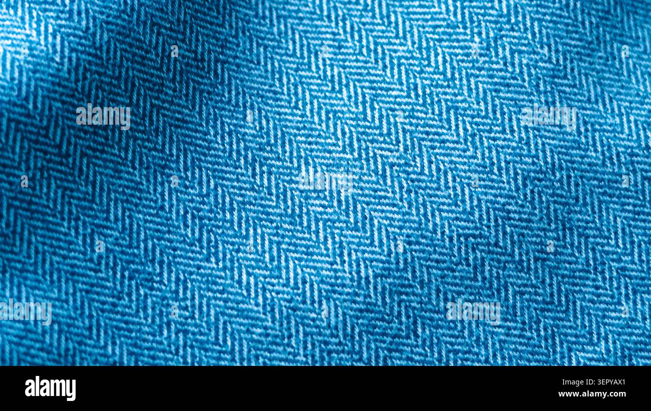 Blue herringbone fabric texture close up. Stock Photo