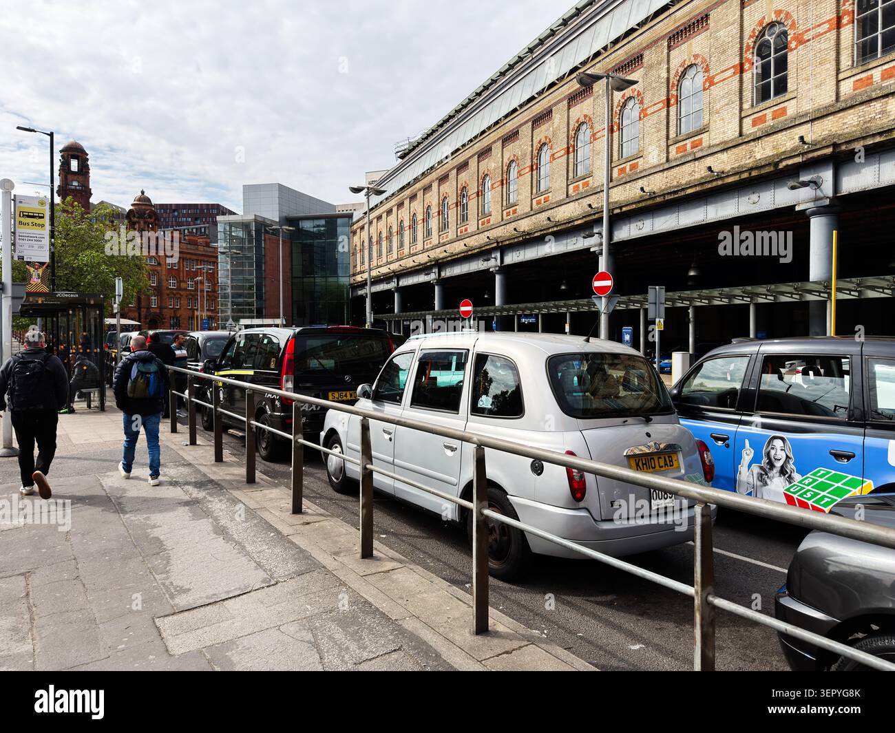 Manchester, UK - May 07, 2026: Repetitive tiled coding text forms a digital programming background evoking software development and developer workspac Stock Photo