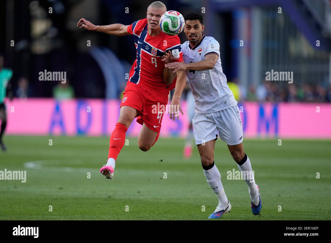 Norway's Erling Haaland (9), left, and Iraq's Zaid Tahseen (4) compete