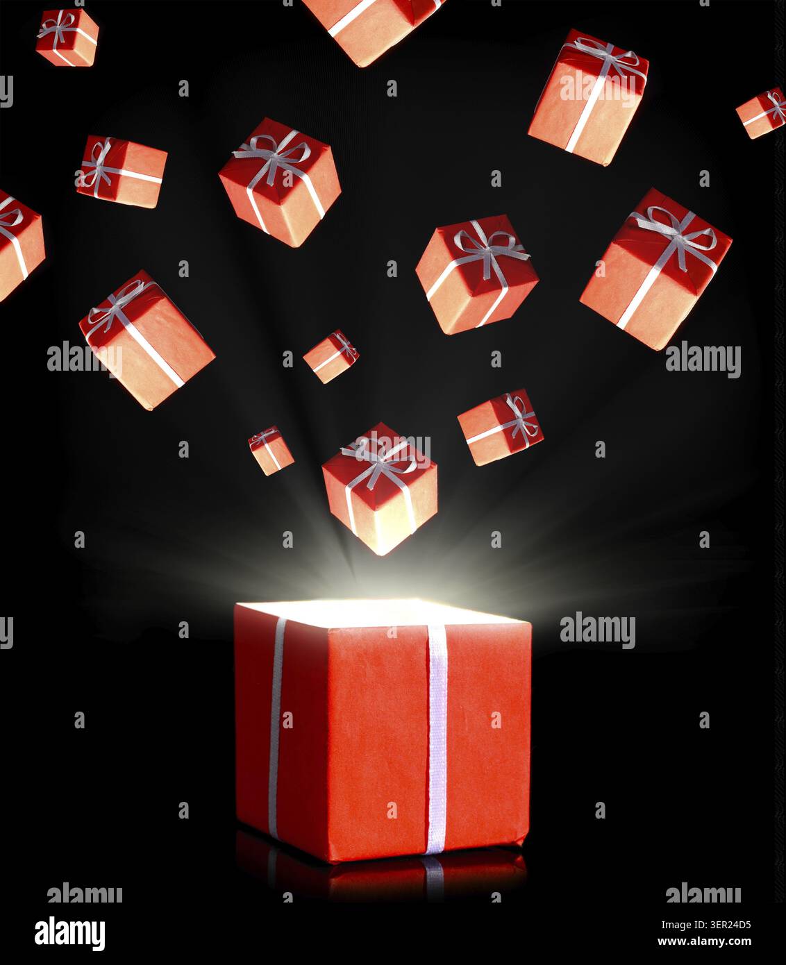 Red gift boxes flying in the dark Stock Photo
