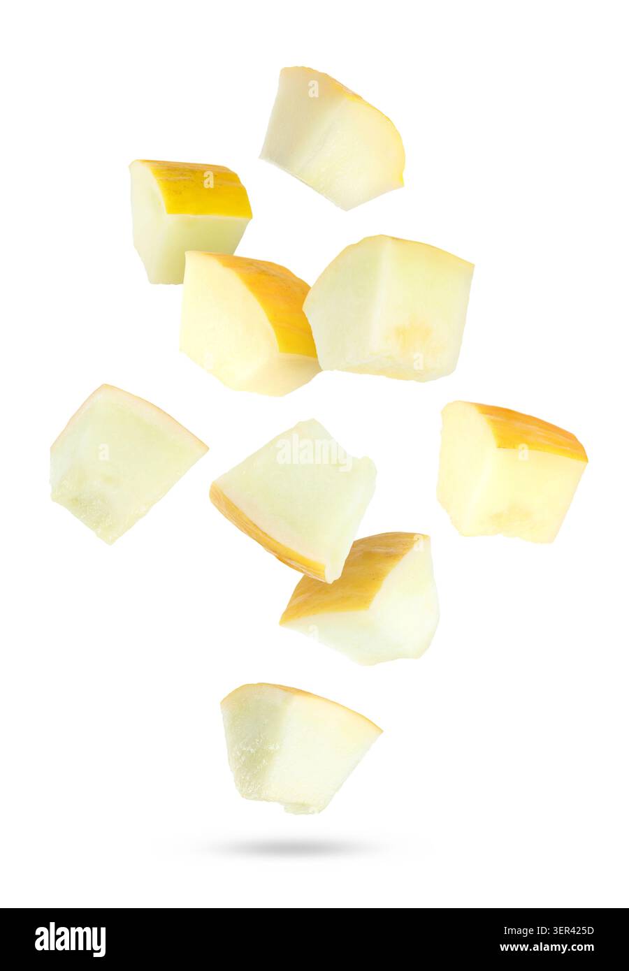 Sweet melon pieces falling against white background Stock Photo