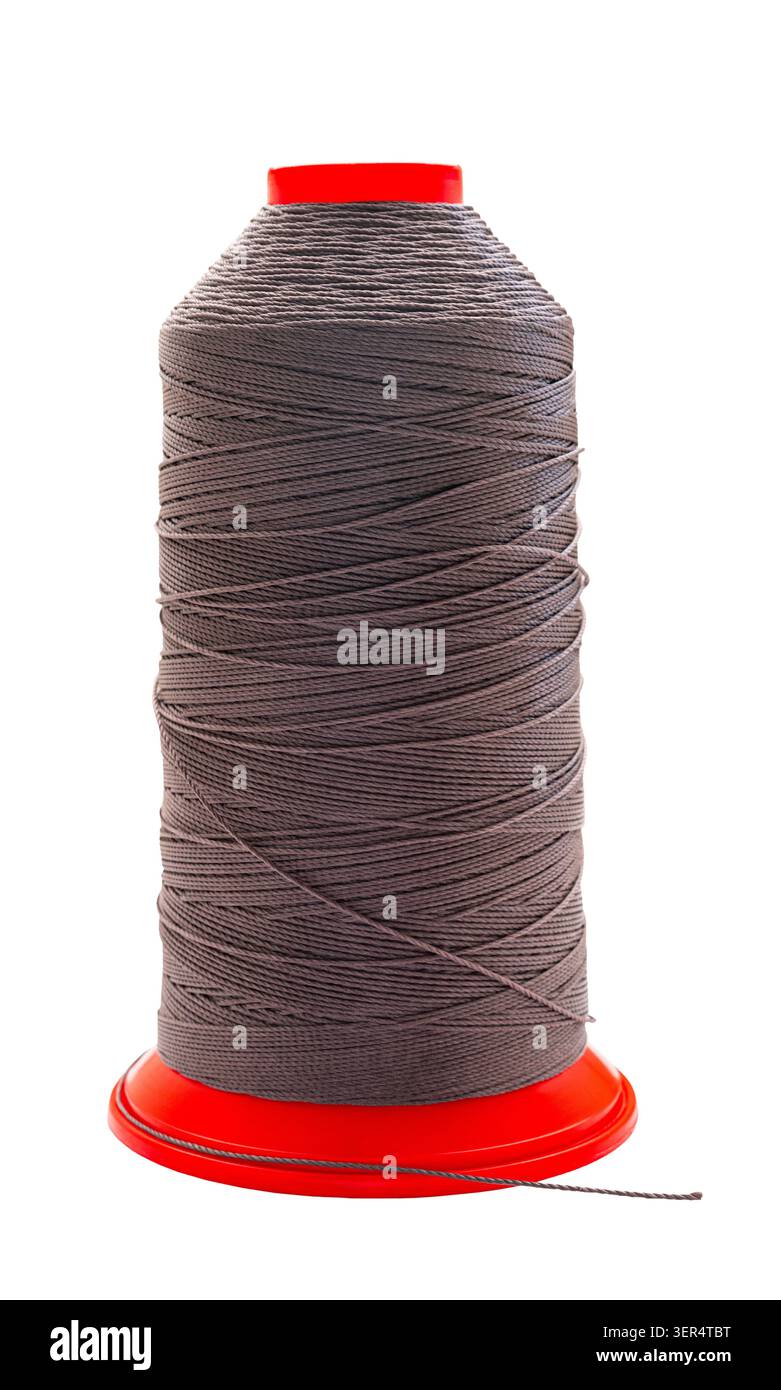 spool of colored thread on a white isolated background Stock Photo