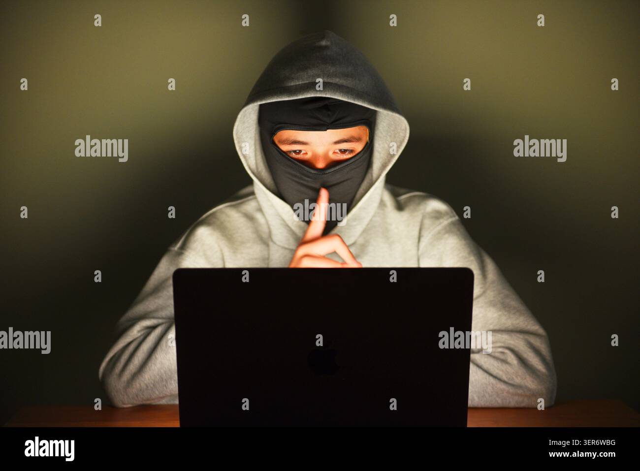 Cyber attacker Stock Photo
