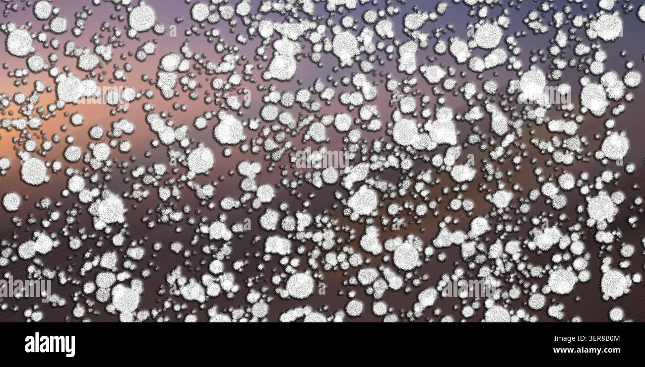 Abstract digital art background featuring a dense pattern of white, textured, circular particles scattered over a soft purple and orange gradient surf Stock Photo