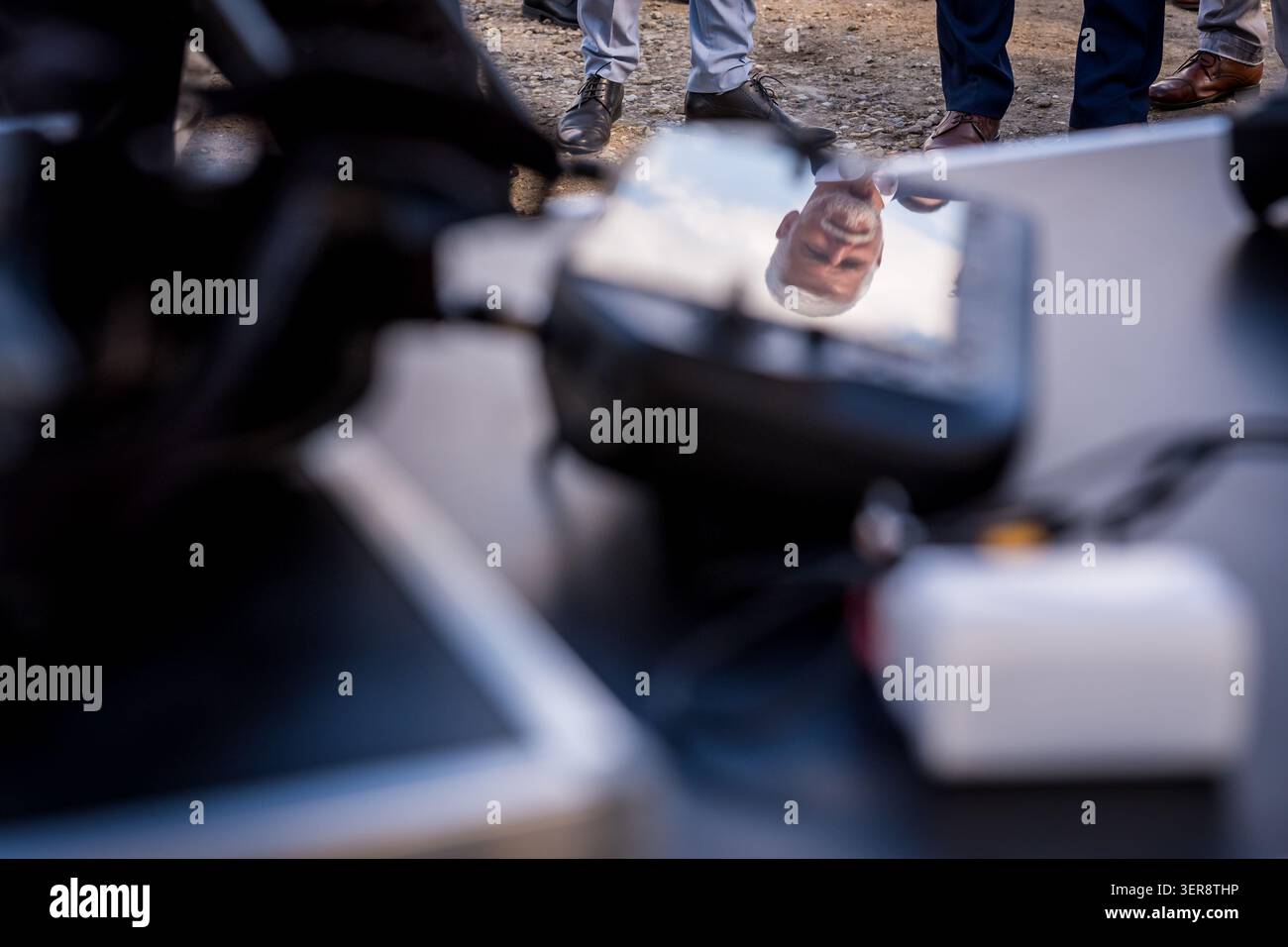 Czech President Petr Pavel reflected in the drone controller during a ...