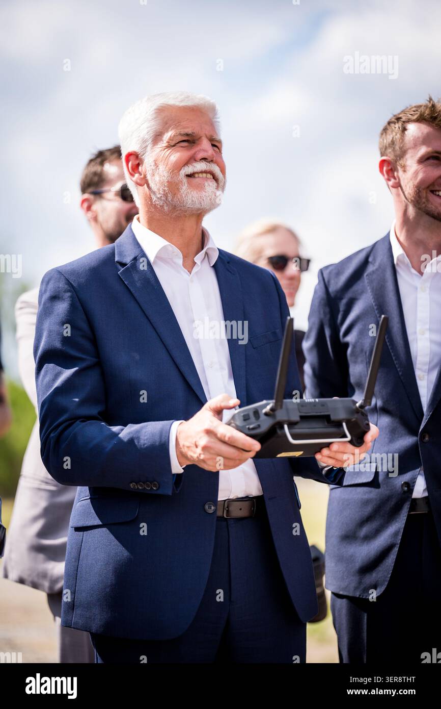 Czech President Petr Pavel pilots a drone during a visit to a drone ...
