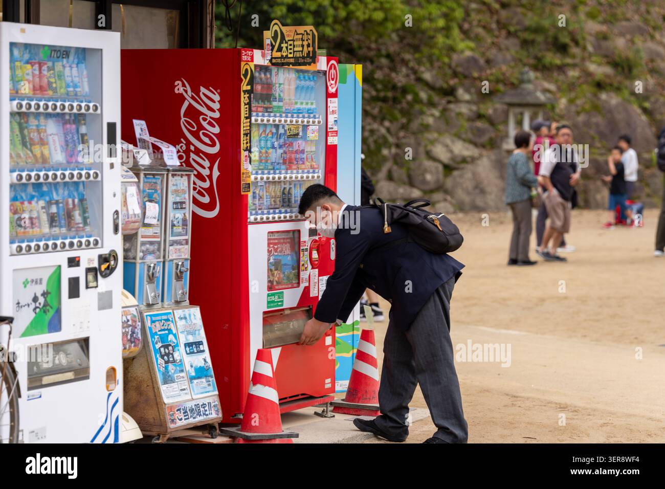 Japan vending machine suit hi-res stock photography and images - Alamy