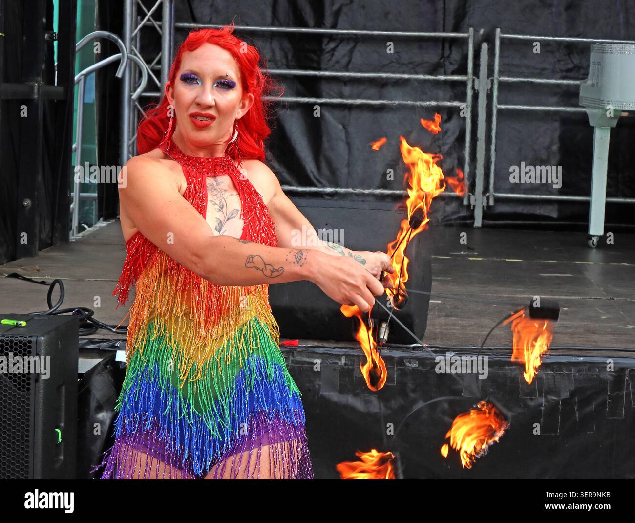 Fire eater performing with flames at Warrington Pride 2026 in Warrington town centre, Cheshire, England, UK. Stock Photo