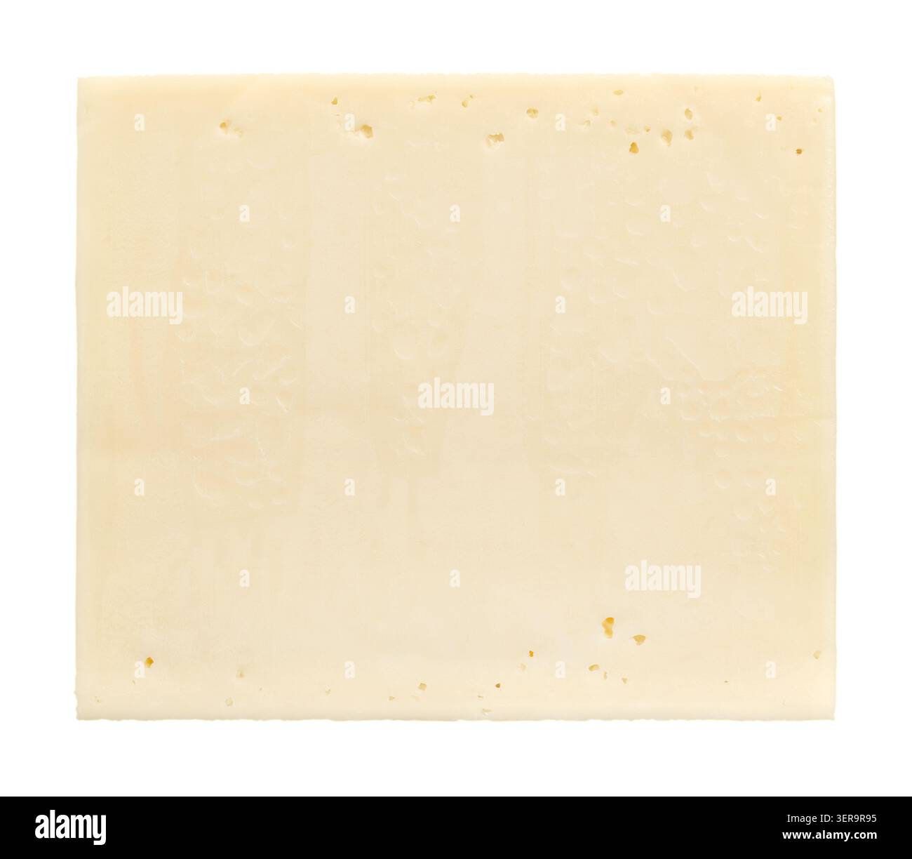 Young Gouda cheese, whole block, isolated, from above. Factory-produced, elastic cheese made from pasteurized cow's milk, with 45% fat in dry matter. Stock Photo
