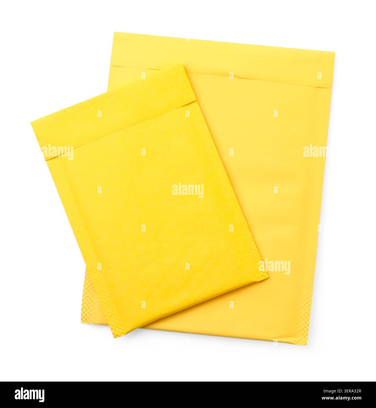 Two yellow paper envelopes isolated on white, top view Stock Photo
