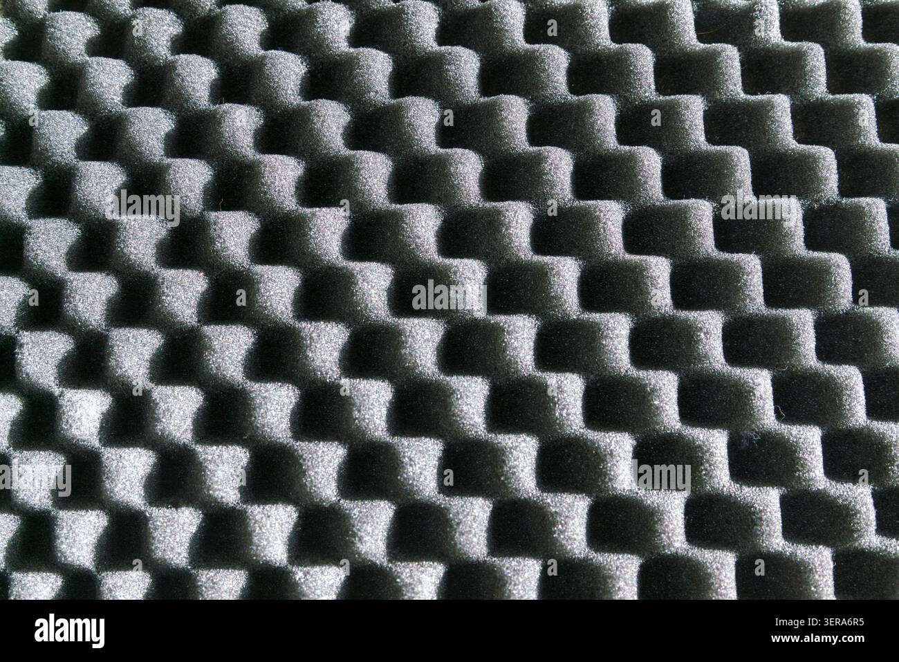 Grey sound absorbing foam panel creating an interesting texture and pattern Stock Photo