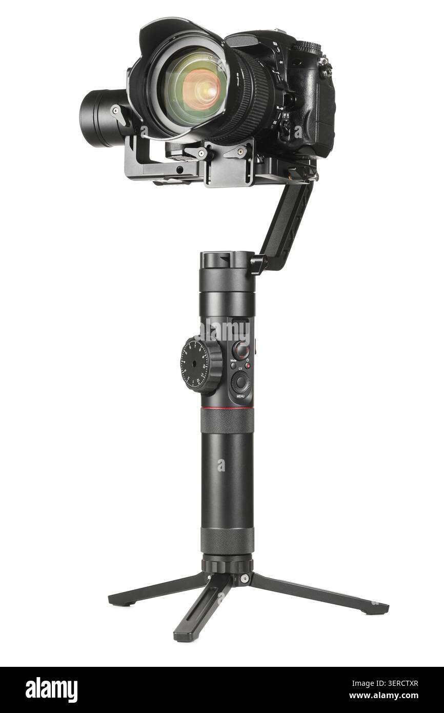 Gimbal three-axis motorized stabilizer with mounted DSLR camera isolated on white background Stock Photo