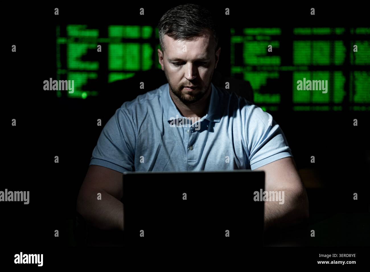 Cyber attack hacker uses computer. Cyber attack hacker writes malicious code. Cyber attack hacker targets network security. Cyber attack hacker Stock Photo