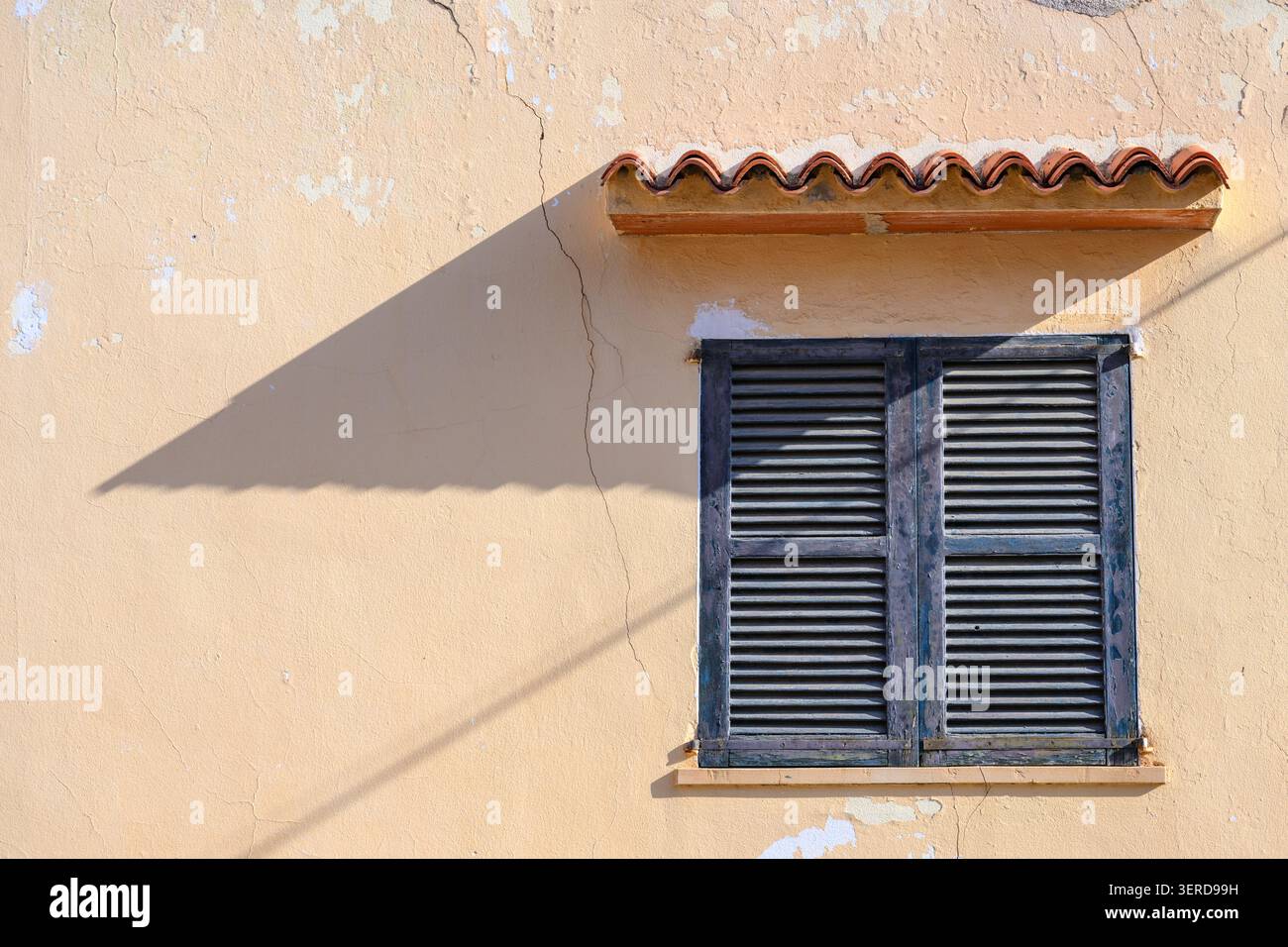 Vibrant blue window shutters, closed Stock Photo