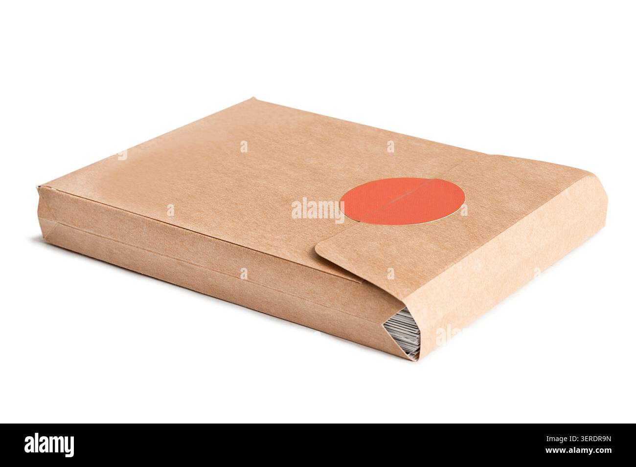 Blank craft paper closed packet lying on white background Stock Photo