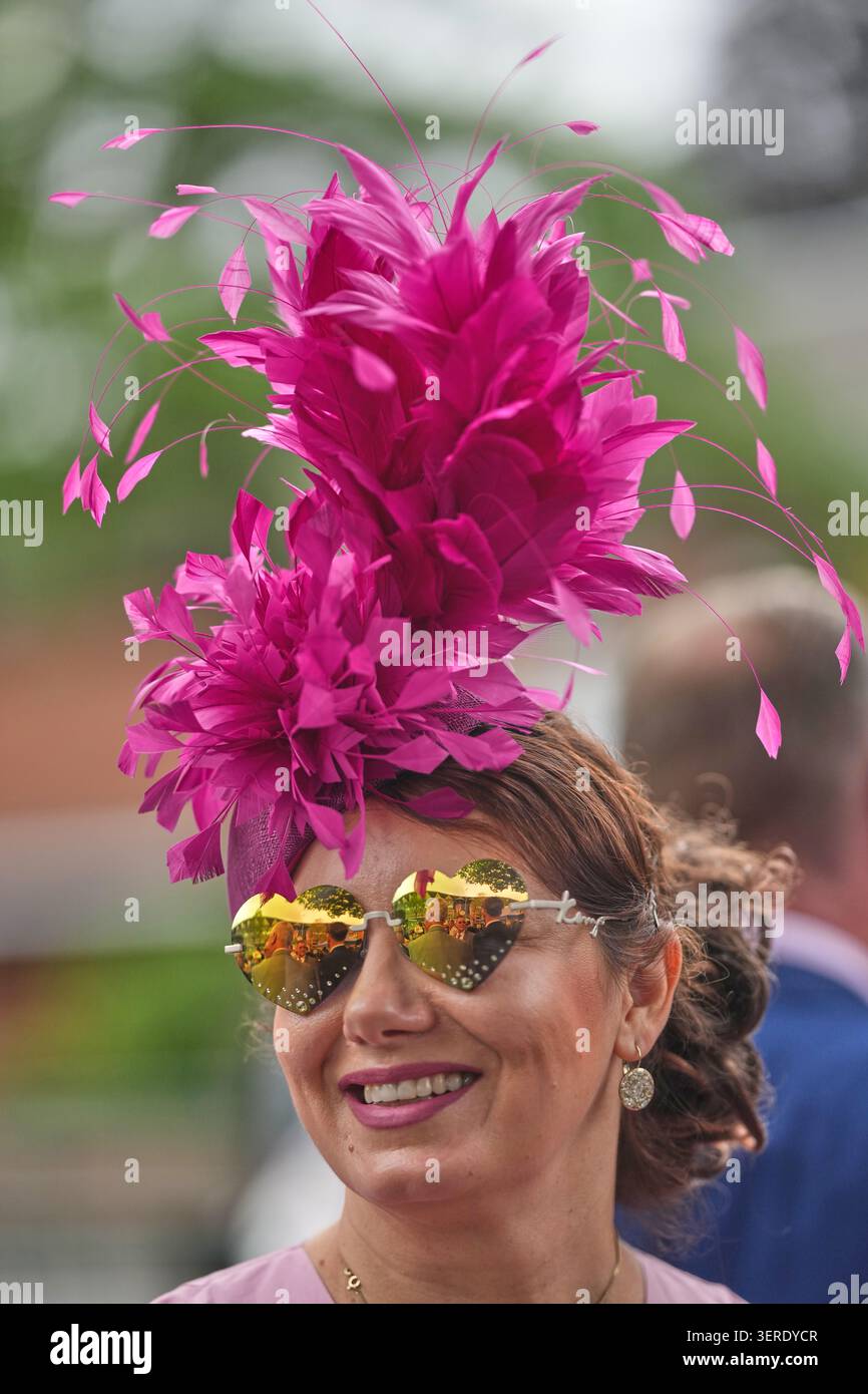 Racegoer Anna Gilder smiles as she arrives on the third day of the ...