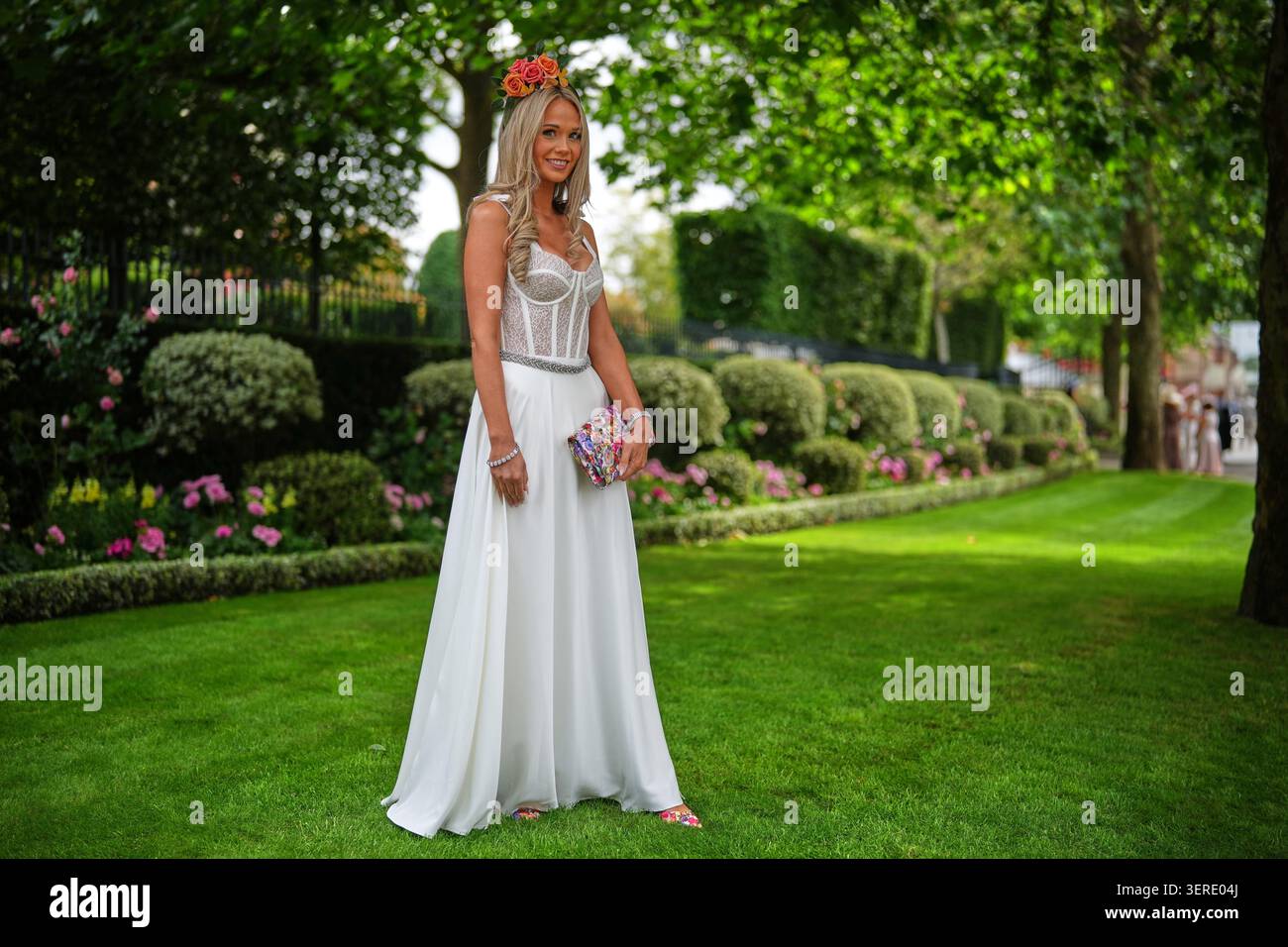 Racegoer Victoria Hail-Smith poses for a picture as she arrives on the ...