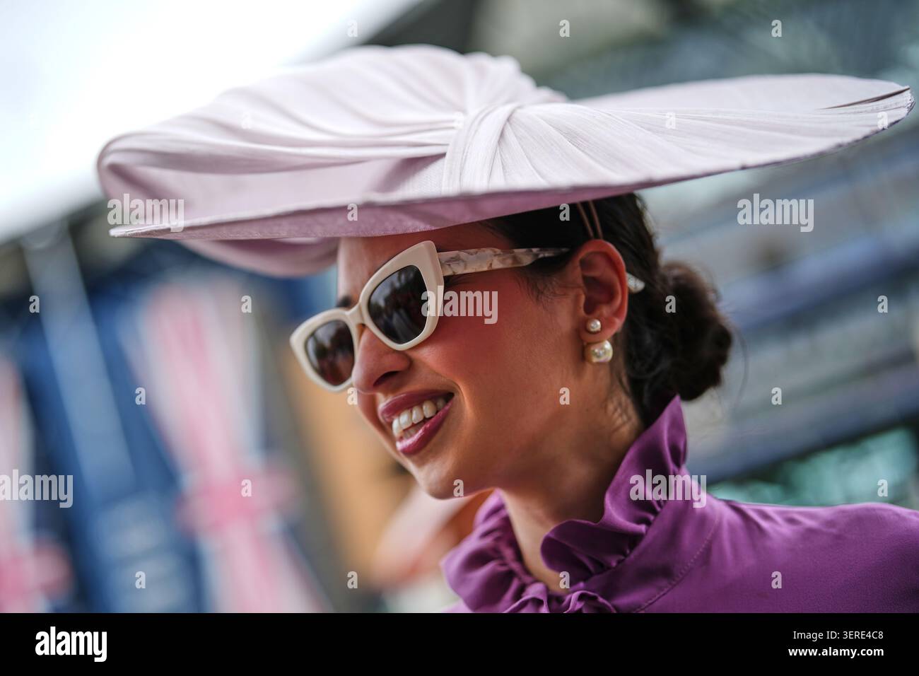 Racegoer Jordan Rose smiles as she arrives on the third day of the ...