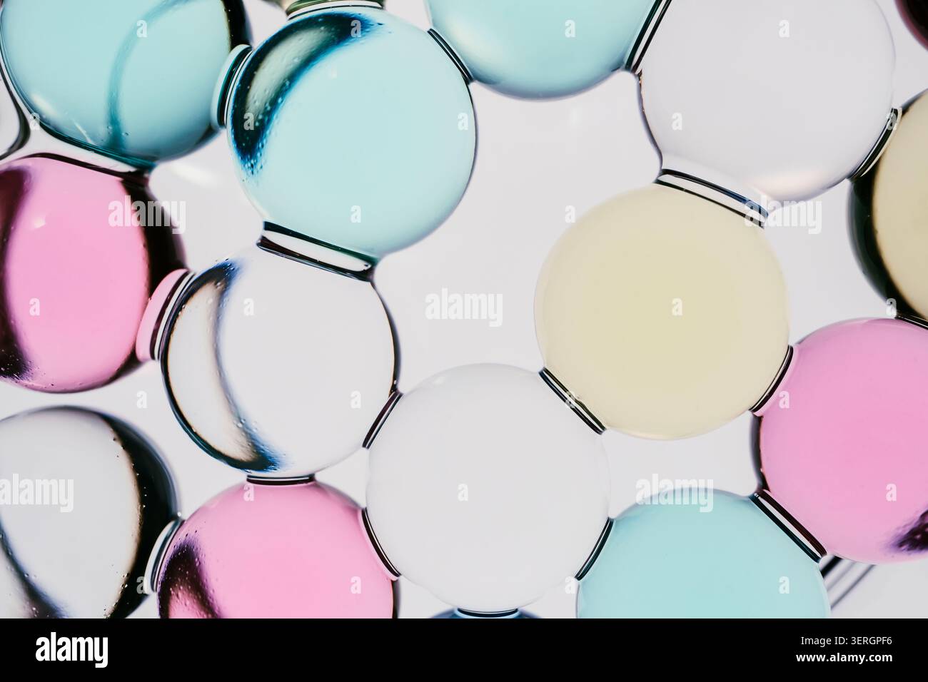 Colorful hydrogel spheres forming abstract network structure Stock Photo