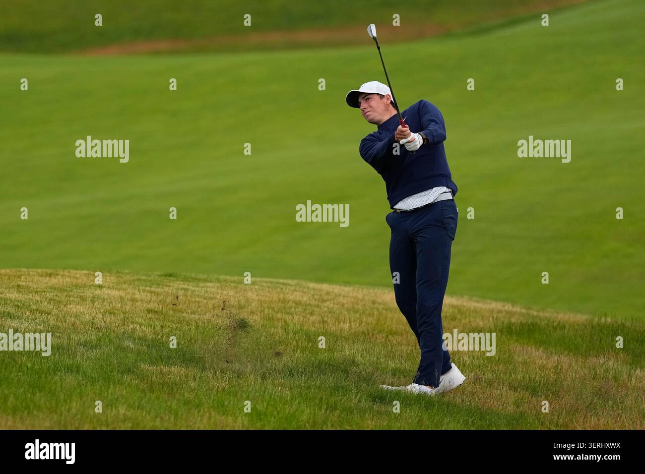 Ben James hits from the rough on the 12th hole during the first round ...