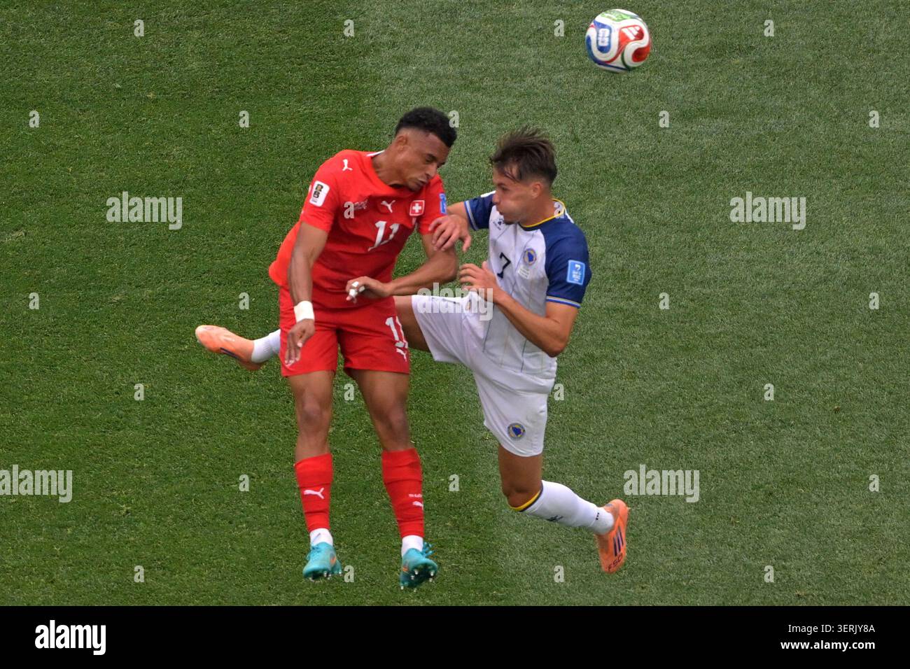 switzerland-s-dan-ndoye-11-and-bosnia-s-amar-dedic-7-fight-for-the
