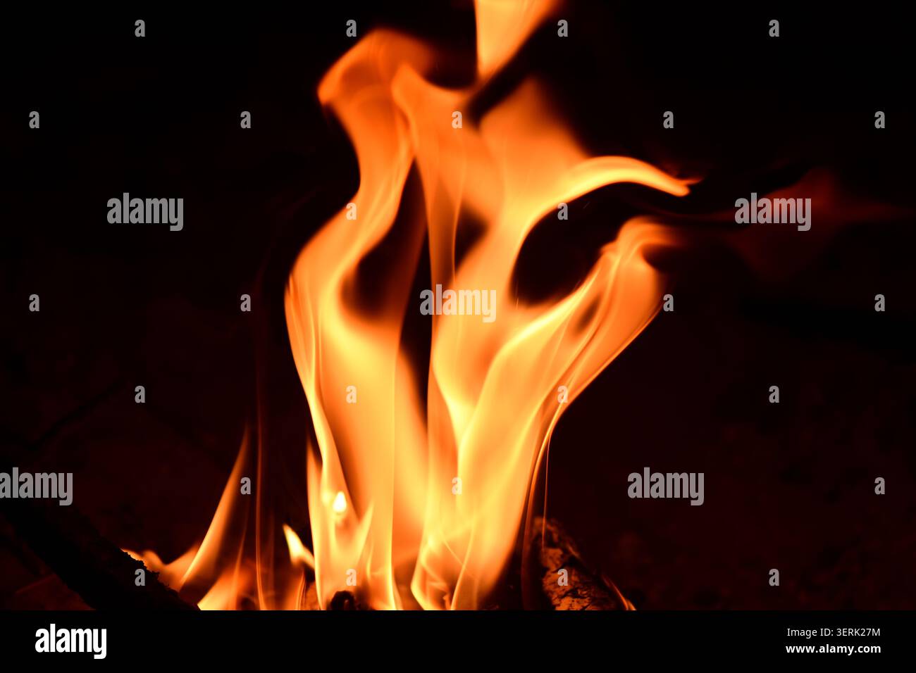 sparks and fire flame on black background Stock Photo