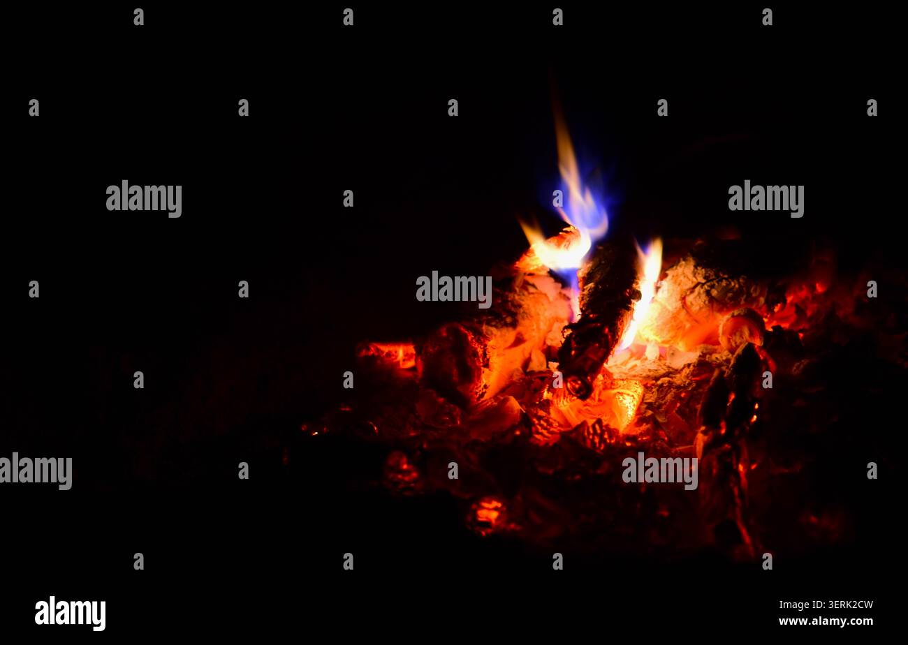 sparks and fire flame on black background Stock Photo