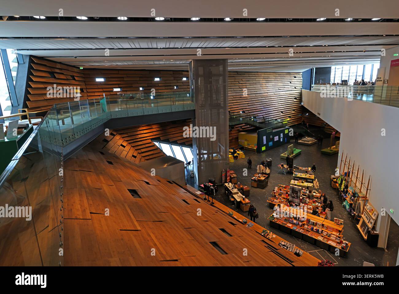 V&A Dundee interior viewed from an upper level with timber stairs and public spaces in Dundee, Scotland, UK. Stock Photo