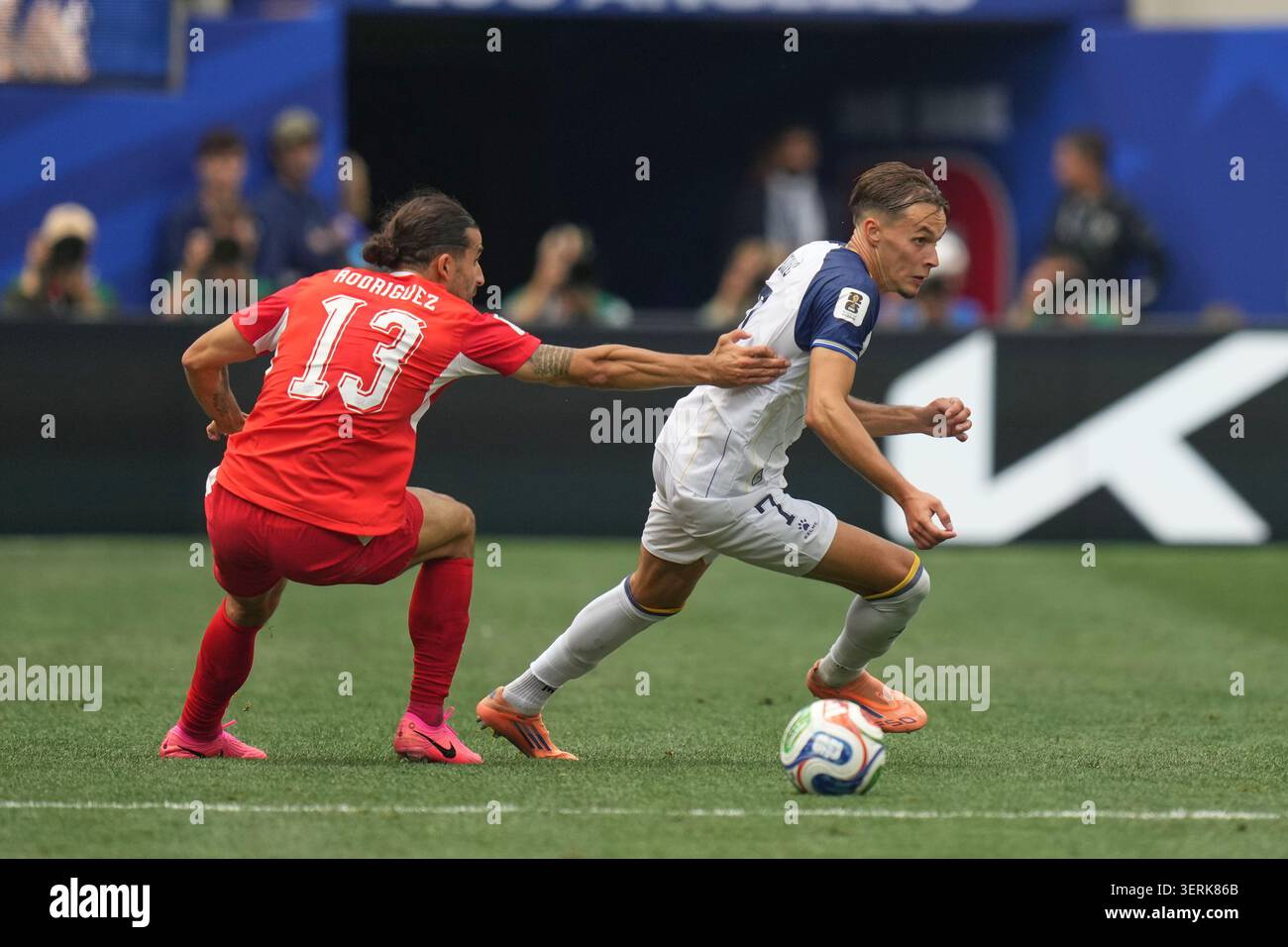 switzerland-s-ricardo-rodriguez-left-challenges-bosnia-s-amar-dedic
